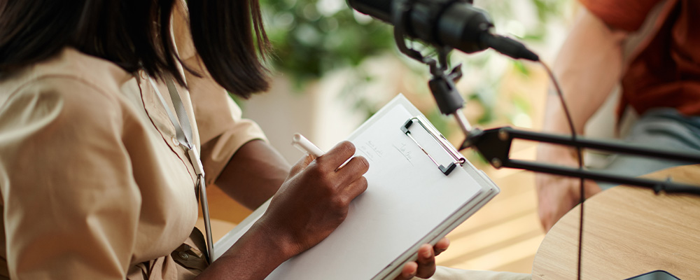 podcast guest writing on form